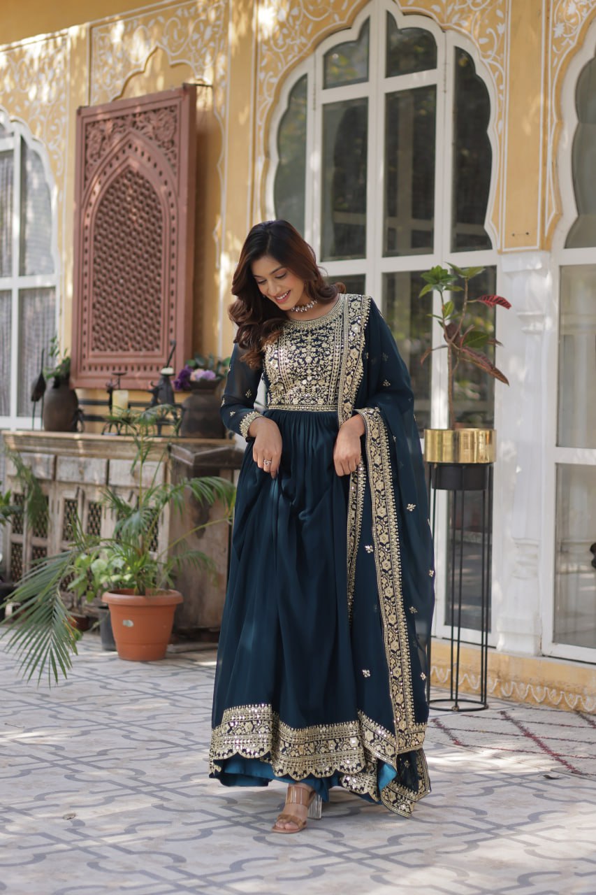 Women's Luxurious Plum Velvet Anarkali Gown with Heavy Gold Zari & Sequin Embroidery β Perfect for Weddings & Grand Fest