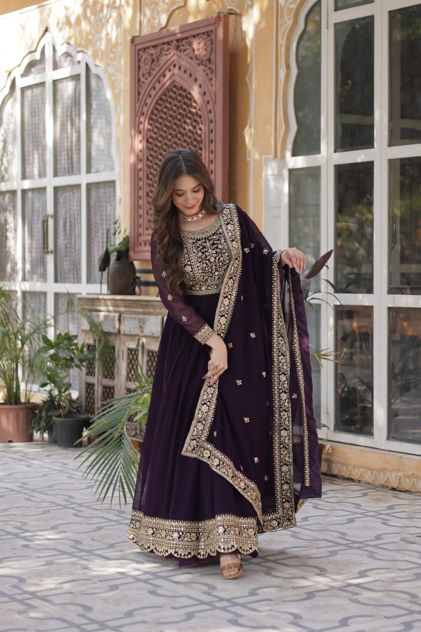 Women's Luxurious Plum Velvet Anarkali Gown with Heavy Gold Zari & Sequin Embroidery β Perfect for Weddings & Grand Fest