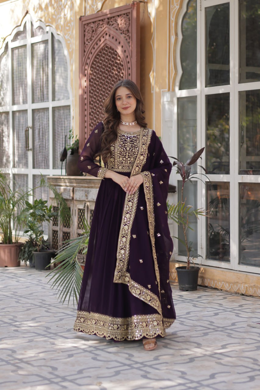 Women's Luxurious Plum Velvet Anarkali Gown with Heavy Gold Zari & Sequin Embroidery β Perfect for Weddings & Grand Fest