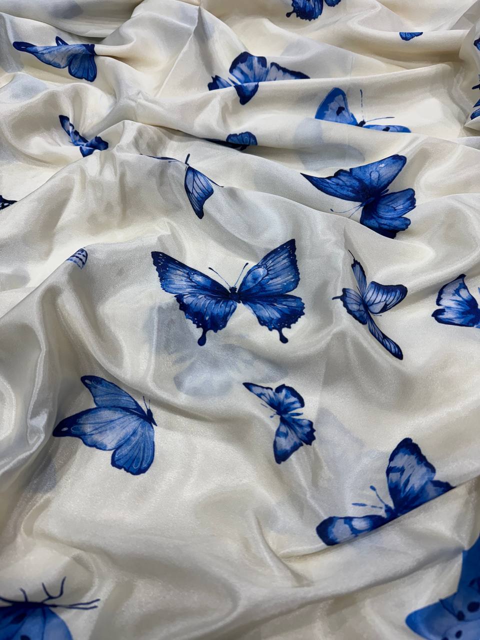 Women's Chic Snow White Georgette Saree with Vibrant Blue Butterfly Digital Print & Contrasting Border – Perfect for Cas