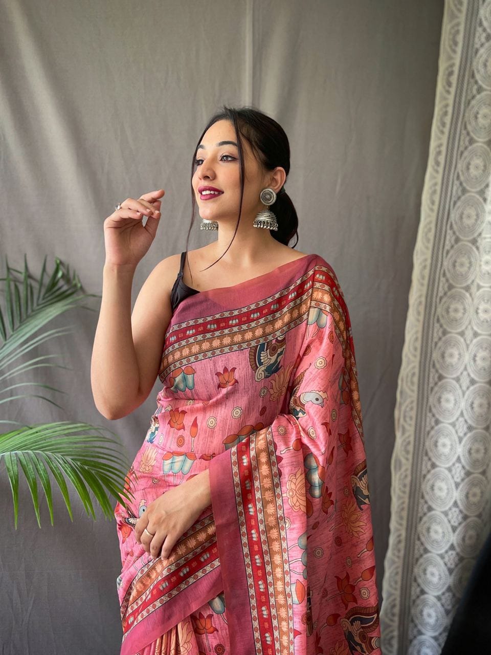 Women's Artistic Terracotta Orange Linen Saree with Kalamkari Inspired Print & Tassel Detailing – Perfect for Casual Fes